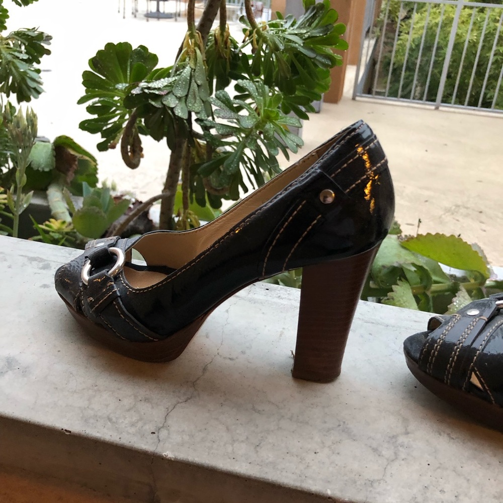 Coach bondage inspired open toe pumps